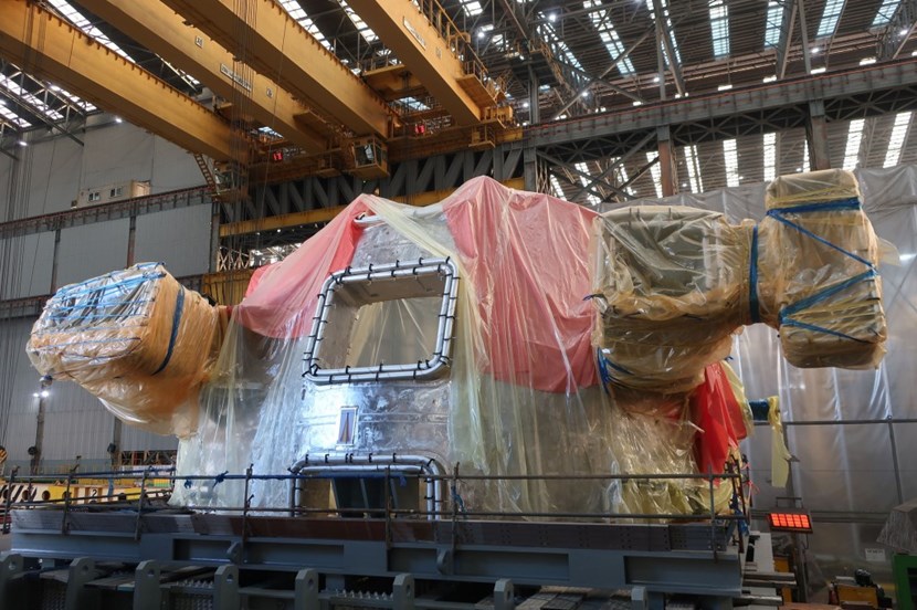 The 440-tonne sector sits on its transport platform in the dedicated vacuum vessel workshop at Hyundai Heavy Industries. Once inserted into protective housing it will be ready to ship. (Click to view larger version...)